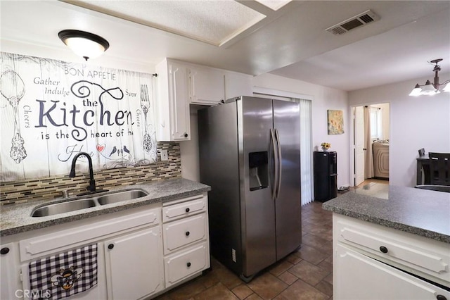 18353 Hackberry St, Hesperia, CA 92345 - kitchen with stainless steel fridge, a sink, backsplash, and white cabinetry