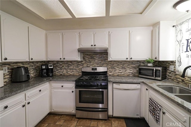 18353 Hackberry St, Hesperia, CA 92345 - kitchen featuring appliances with stainless steel finishes, under cabinet range hood, a sink, and white cabinetry