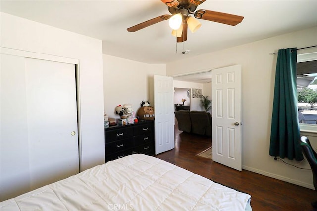 18353 Hackberry St, Hesperia, CA 92345 - bedroom featuring dark wood finished floors, a ceiling fan, and baseboards