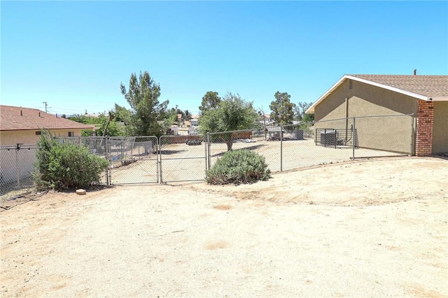 18353 Hackberry St, Hesperia, CA 92345 - view of yard featuring a gate