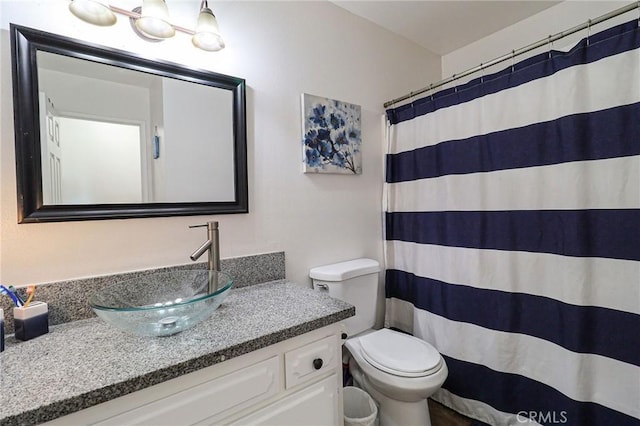 18353 Hackberry St, Hesperia, CA 92345 - full bathroom with toilet, vanity, and a shower with curtain