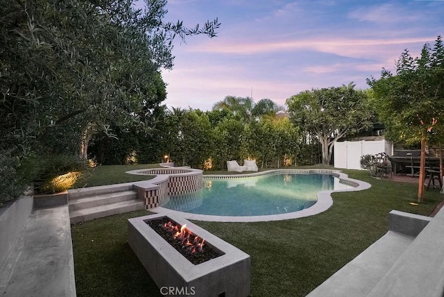 22372 Harwich Ln, Huntington Beach, CA 92646 - pool at dusk featuring an outdoor fire pit