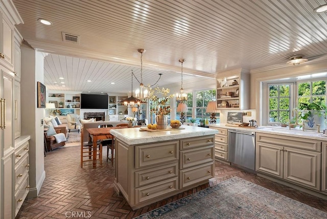 22372 Harwich Ln, Huntington Beach, CA 92646 - kitchen with dishwasher, a chandelier, open floor plan, a center island, and a fireplace