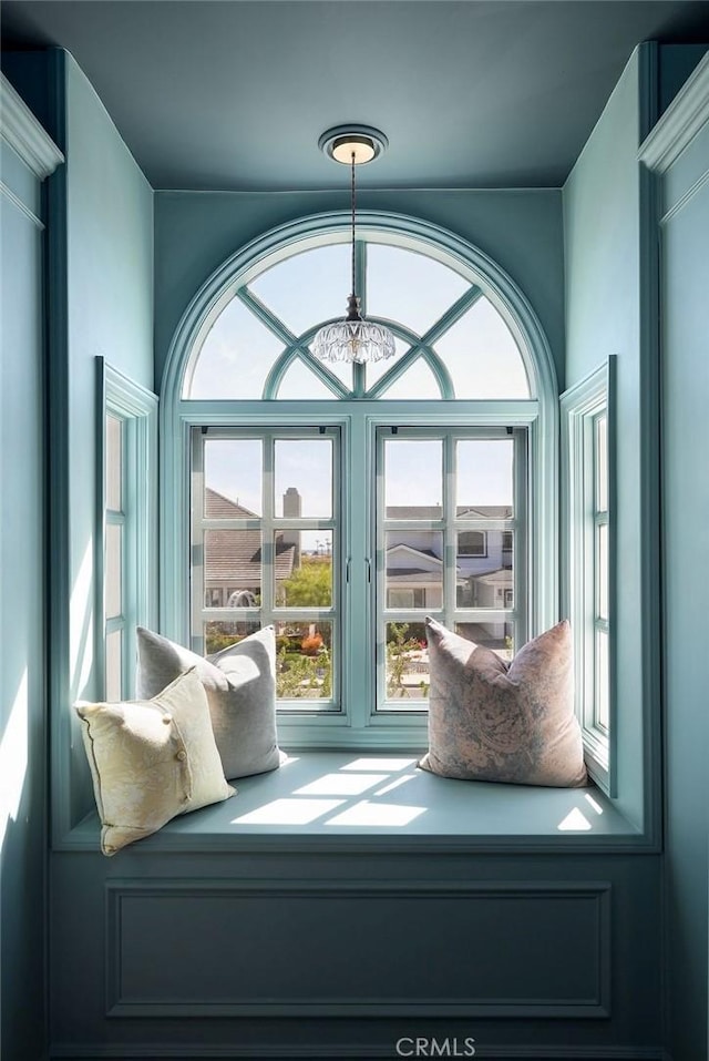 22372 Harwich Ln, Huntington Beach, CA 92646 - sitting room with healthy amount of natural light and a chandelier