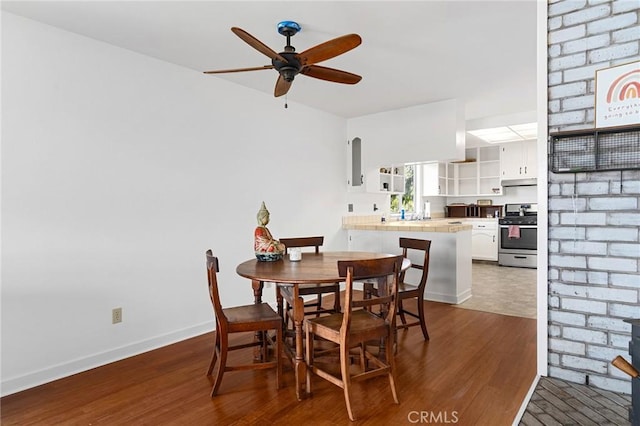 814 Natures Way, Paradise, CA 95969 - dining room featuring dark wood-style flooring, a ceiling fan, and baseboards
