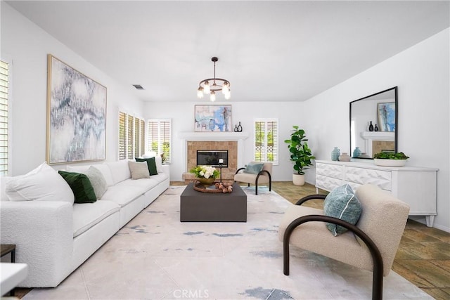 12800 N Overlook Dr, Rancho Cucamonga, CA 91739 - living room with a glass covered fireplace and a chandelier