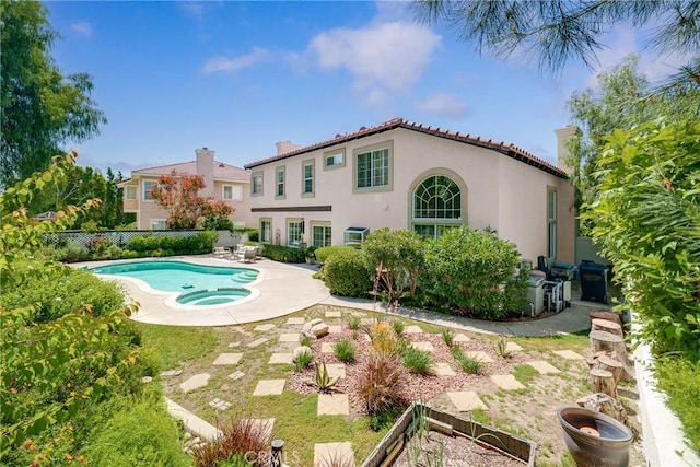 12800 N Overlook Dr, Rancho Cucamonga, CA 91739 - view of swimming pool with a patio, a fenced backyard, and a pool with connected hot tub