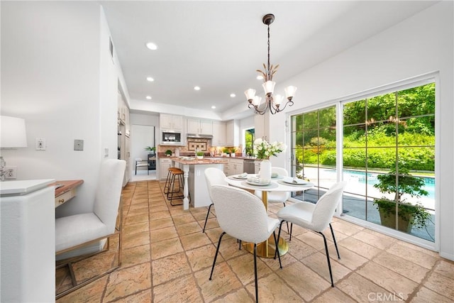 12800 N Overlook Dr, Rancho Cucamonga, CA 91739 - dining room featuring recessed lighting, stone tile floors, and a chandelier