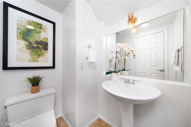 12800 N Overlook Dr, Rancho Cucamonga, CA 91739 - bathroom with toilet and baseboards