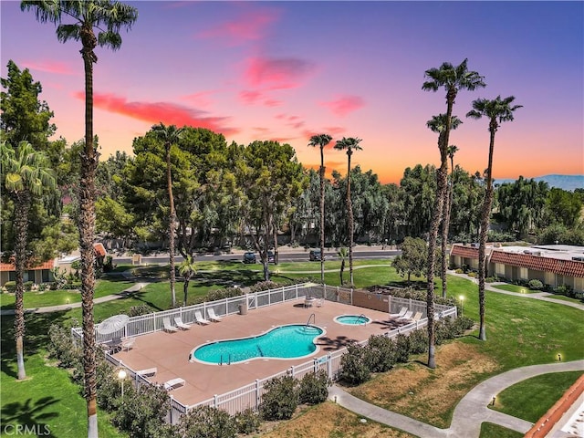 69723 Encanto Ct, Rancho Mirage, CA 92270 - community pool with a patio, view of scattered trees, and a community hot tub