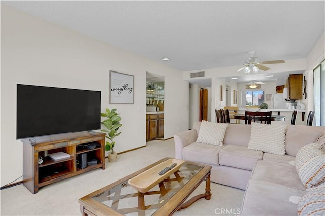 69723 Encanto Ct, Rancho Mirage, CA 92270 - living room with light colored carpet and a ceiling fan