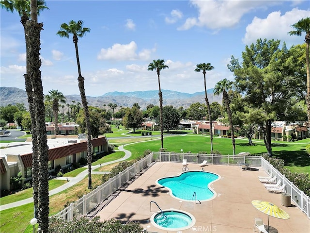 69723 Encanto Ct, Rancho Mirage, CA 92270 - community pool with a mountain view and a patio