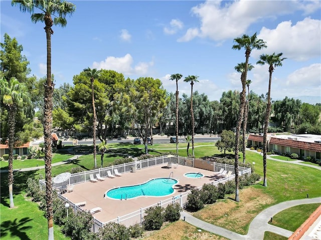 69723 Encanto Ct, Rancho Mirage, CA 92270 - community pool featuring view of wooded area and a patio