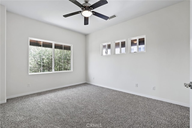 604 Indianapolis Ave, Huntington Beach, CA 92648 - carpeted spare room featuring baseboards and a ceiling fan