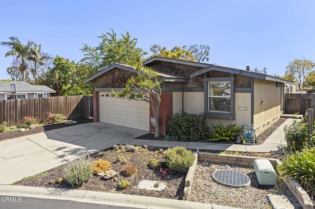 1025 Cachuma Ave Unit 32, Ventura, CA 93004 - view of front of property featuring an attached garage and concrete driveway