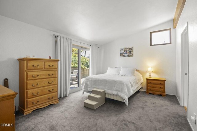 1025 Cachuma Ave Unit 32, Ventura, CA 93004 - carpeted bedroom featuring lofted ceiling and access to exterior