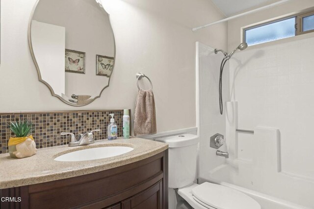 1025 Cachuma Ave Unit 32, Ventura, CA 93004 - full bath with toilet,  shower combination, vanity, and decorative backsplash