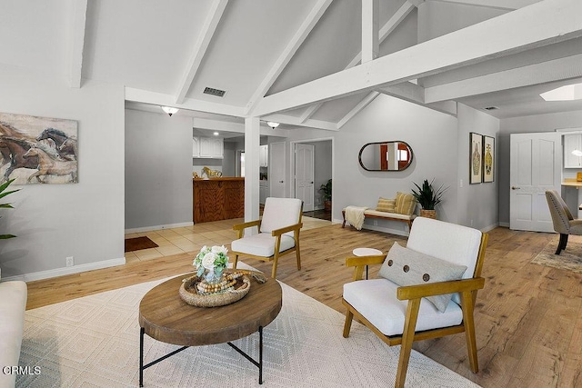 2735 Los Pinos Cir, Camarillo, CA 93012 - living room with baseboards, high vaulted ceiling, beamed ceiling, and light wood-style floors