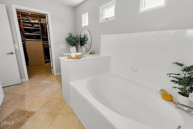 2735 Los Pinos Cir, Camarillo, CA 93012 - full bath with a bath, a spacious closet, and stone finish flooring