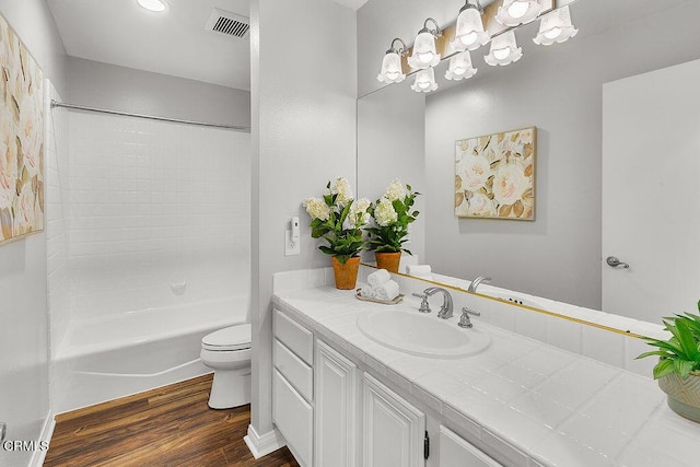2735 Los Pinos Cir, Camarillo, CA 93012 - full bath with toilet, vanity, wood finished floors, and shower / washtub combination