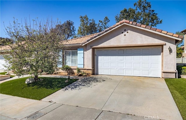689 Twin Hills Dr, Banning, CA 92220 - view of front of house with stucco siding, a garage, and a front yard