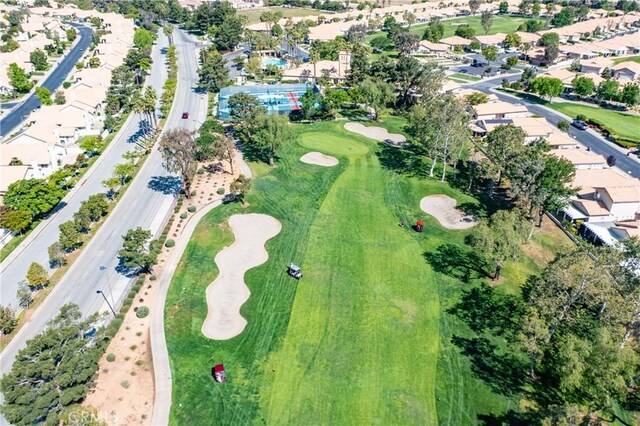 689 Twin Hills Dr, Banning, CA 92220 - aerial view of property and surrounding area featuring a golf club and nearby suburban area