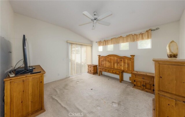 689 Twin Hills Dr, Banning, CA 92220 - bedroom with vaulted ceiling, carpet floors, and a ceiling fan
