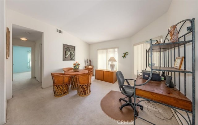 689 Twin Hills Dr, Banning, CA 92220 - office area featuring light carpet and vaulted ceiling