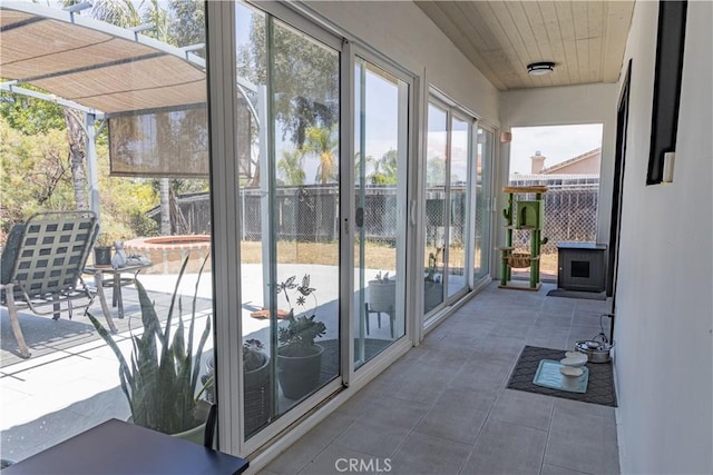 24048 Cruise Circle Dr, Canyon Lake, CA 92587 - unfurnished sunroom featuring a hot tub and tile patterned floors
