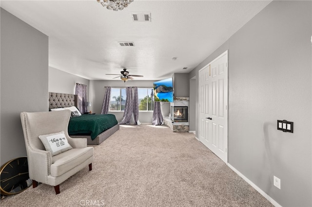 18936 Summerleaf Ln, Riverside, CA 92504 - bedroom with carpet floors, a multi sided fireplace, baseboards, and a ceiling fan