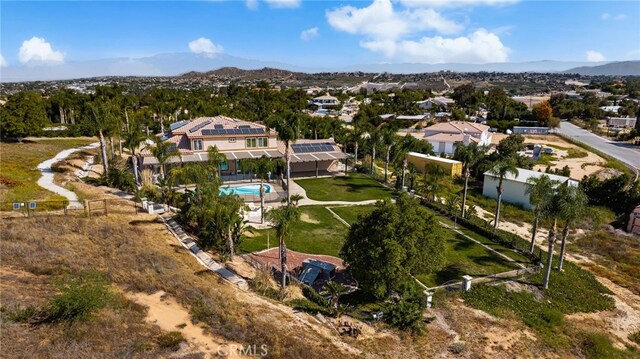 18936 Summerleaf Ln, Riverside, CA 92504 - aerial overview of property's location featuring nearby suburban area and a mountain backdrop