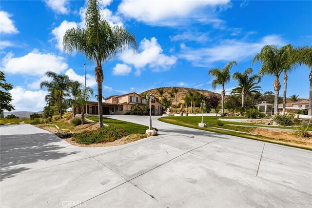 18936 Summerleaf Ln, Riverside, CA 92504 - view of road with a mountain view and street lighting