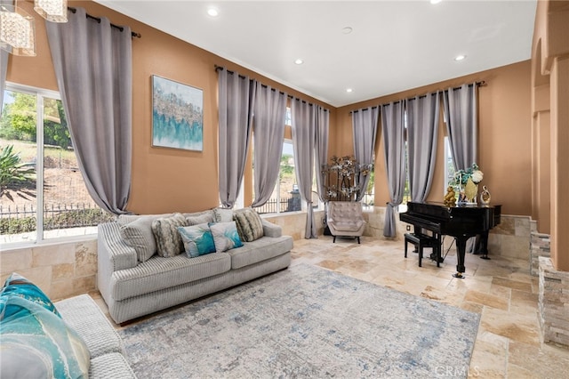 18936 Summerleaf Ln, Riverside, CA 92504 - living room featuring stone tile floors, healthy amount of natural light, and recessed lighting