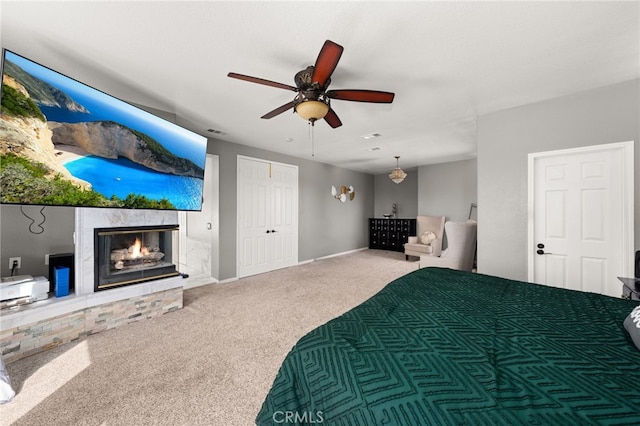 18936 Summerleaf Ln, Riverside, CA 92504 - bedroom with carpet flooring, a multi sided fireplace, ceiling fan, and baseboards