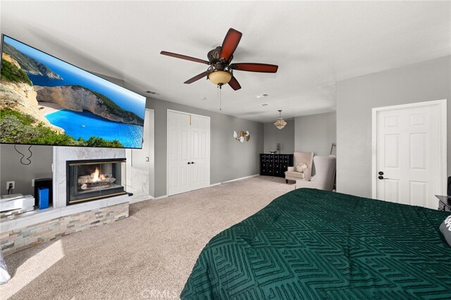 18936 Summerleaf Ln, Riverside, CA 92504 - bedroom with carpet, a multi sided fireplace, ceiling fan, and baseboards
