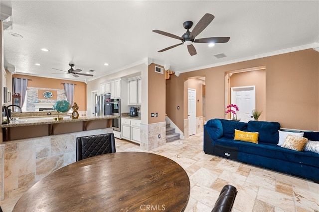 18936 Summerleaf Ln, Riverside, CA 92504 - dining area with ceiling fan, ornamental molding, recessed lighting, and stairs