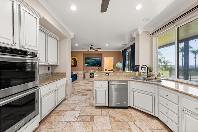 18936 Summerleaf Ln, Riverside, CA 92504 - kitchen featuring stainless steel appliances, ceiling fan, a sink, ornamental molding, and recessed lighting