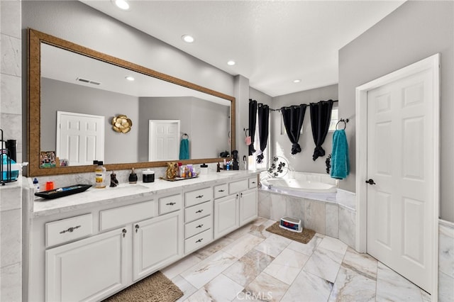 18936 Summerleaf Ln, Riverside, CA 92504 - full bath featuring a garden tub, double vanity, recessed lighting, and marble finish floors