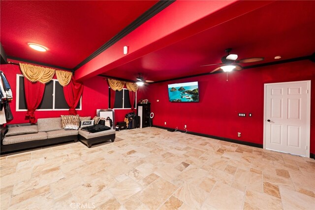 18936 Summerleaf Ln, Riverside, CA 92504 - cinema with stone finish flooring, ceiling fan, and baseboards