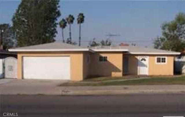 11571 Magnolia, Garden Grove, CA 92841 - ranch-style home featuring an attached garage and concrete driveway