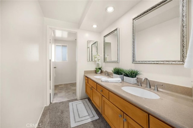 419 Clairmont Ave, Placentia, CA 92870 - bathroom with double vanity, recessed lighting, and baseboards