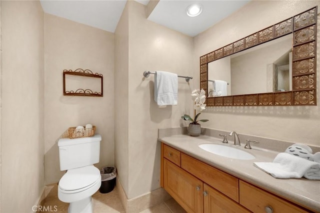 419 Clairmont Ave, Placentia, CA 92870 - bathroom with vanity, toilet, baseboards, and tile patterned floors