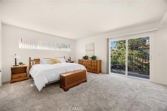 419 Clairmont Ave, Placentia, CA 92870 - bedroom with access to outside, multiple windows, carpet, and a textured ceiling