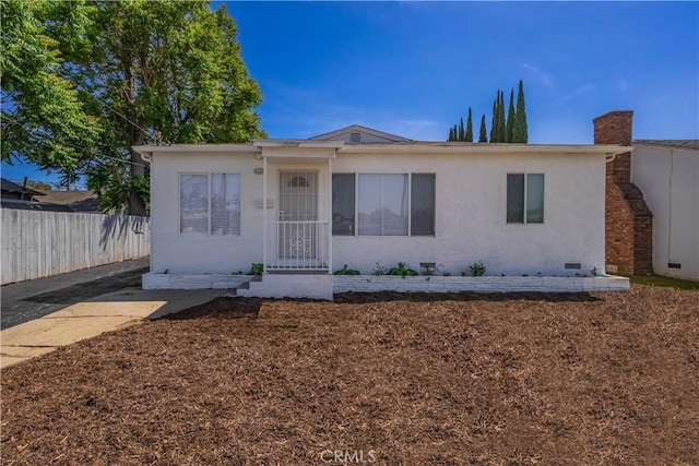 15058 Gale Ave, Hacienda Heights, CA 91745 - view of front facade featuring stucco siding, a chimney, and crawl space