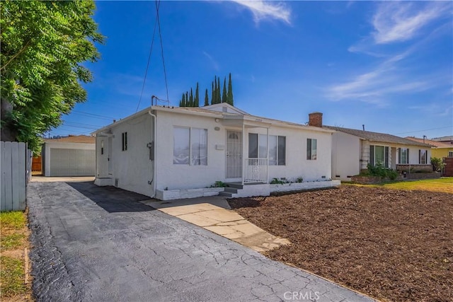 15058 Gale Ave, Hacienda Heights, CA 91745 - view of front facade with stucco siding, a chimney, and a garage