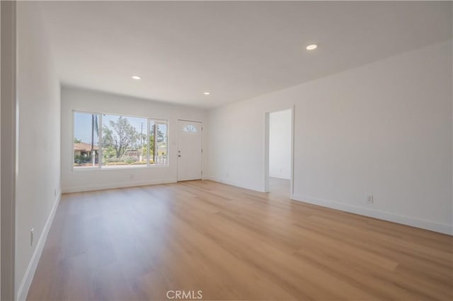 15058 Gale Ave, Hacienda Heights, CA 91745 - empty room with light wood finished floors and recessed lighting