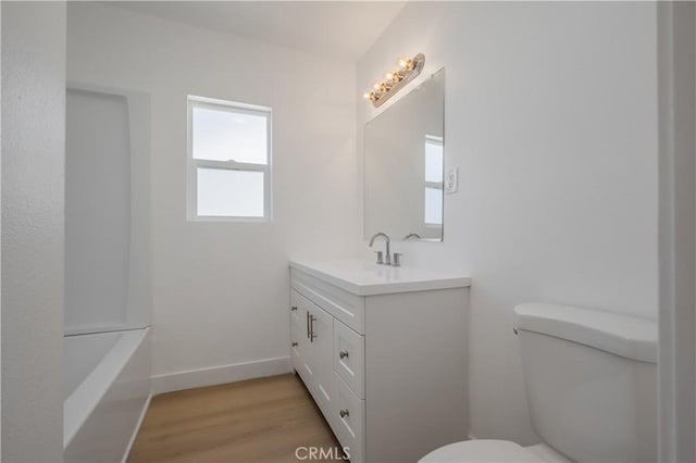 15058 Gale Ave, Hacienda Heights, CA 91745 - bathroom with vanity, wood finished floors, and a tub to relax in