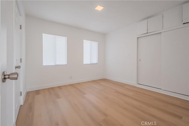 15058 Gale Ave, Hacienda Heights, CA 91745 - unfurnished bedroom with light wood finished floors and a closet