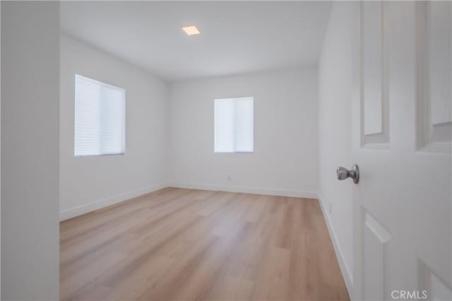15058 Gale Ave, Hacienda Heights, CA 91745 - unfurnished room featuring plenty of natural light, light wood finished floors, and baseboards
