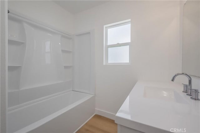 15058 Gale Ave, Hacienda Heights, CA 91745 - full bath featuring vanity, baseboards, wood finished floors, and shower / bath combination
